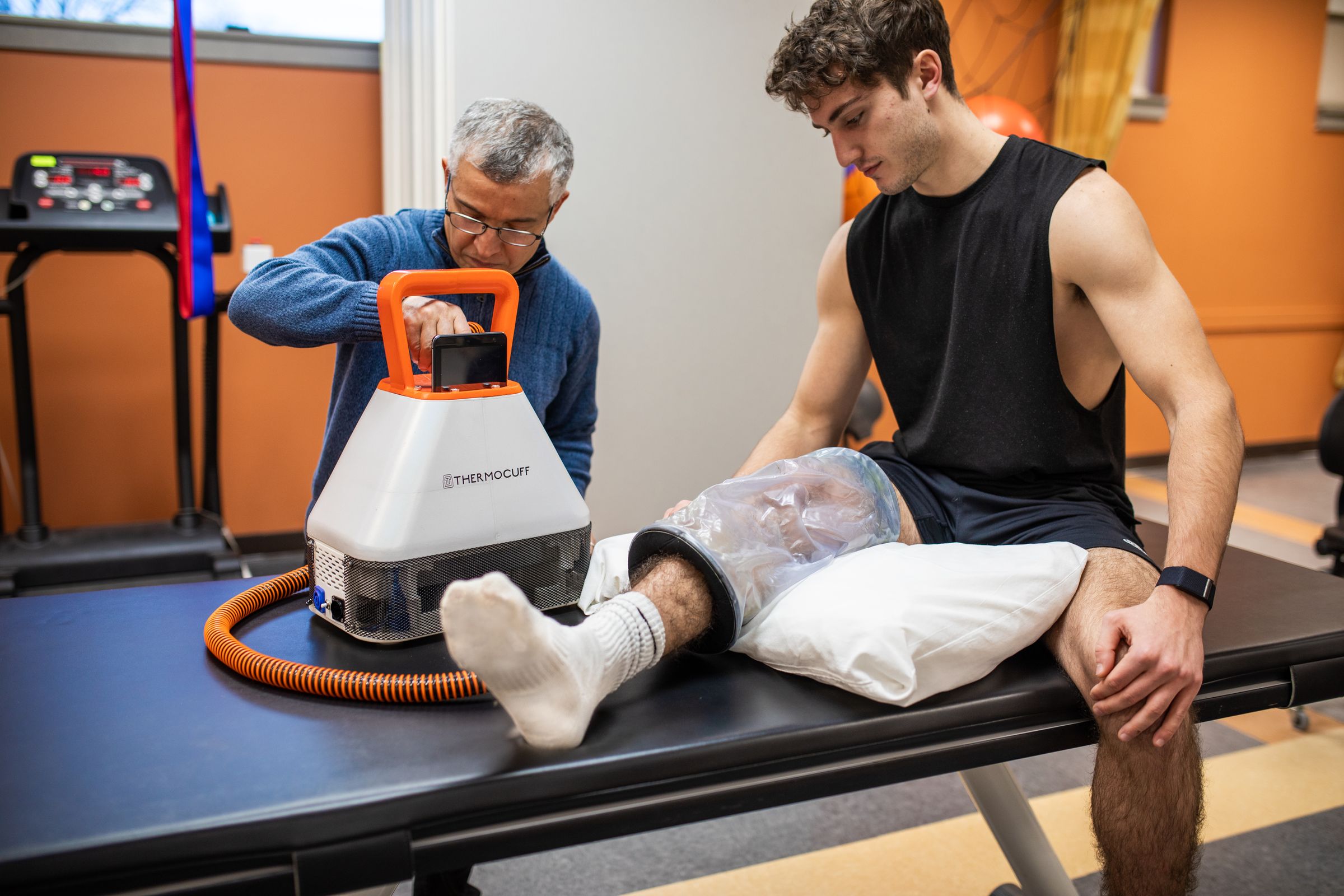 ThermoCuff cuff being fitted to an athlete's leg